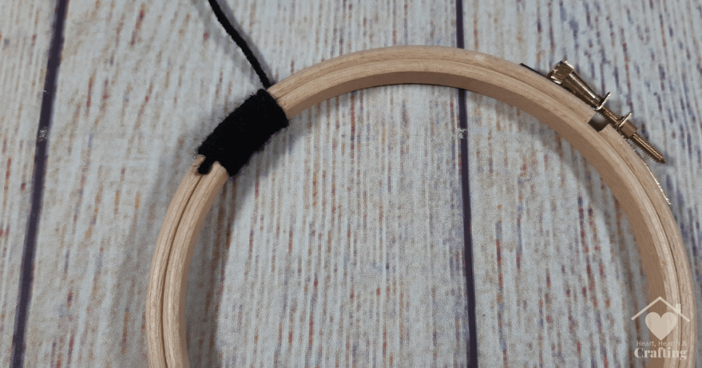 How to Make a DIY Spider Dreamcatcher for Halloween - Yarn Wrapping