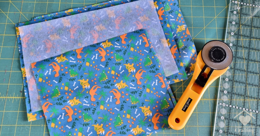 How to Sew Kids Mini Dinosaur Colouring Wallets - Cutting Out the Fabric