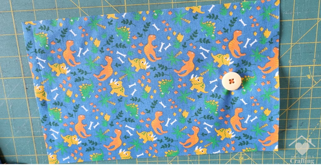 How to Sew Kids Mini Dinosaur Colouring Wallets - Button
